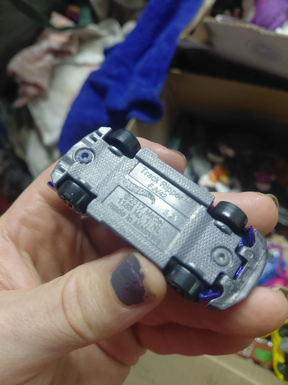 1:64 scale Hot Wheels Track Ripper in metallic blue